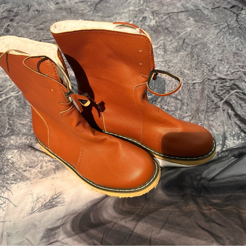The orange rust type boots  with faux fur lining